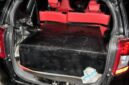 KETERANGAN  FHOTO: Sebuah mobil Daihatsu Sigra tampak digunakan untuk mengangkut bahan bakar minyak (BBM) ilegal di wilayah Kutai Kartanegara. Terlihat bagian bagasi belakang telah dimodifikasi dengan kotak penyimpanan besar yang diduga sebagai tempat penampungan BBM. Kendaraan ini diamankan sebagai barang bukti dalam kegiatan penindakan oleh pihak berwenang. (Dok: Kawalkaltim.com/Masruji)
