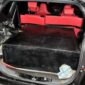 KETERANGAN  FHOTO: Sebuah mobil Daihatsu Sigra tampak digunakan untuk mengangkut bahan bakar minyak (BBM) ilegal di wilayah Kutai Kartanegara. Terlihat bagian bagasi belakang telah dimodifikasi dengan kotak penyimpanan besar yang diduga sebagai tempat penampungan BBM. Kendaraan ini diamankan sebagai barang bukti dalam kegiatan penindakan oleh pihak berwenang. (Dok: Kawalkaltim.com/Masruji)