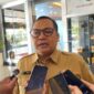 Keterangan: Kepala Dinas Kesehatan Kaltim, Jaya Mualimin, menjelaskan alasan redistribusi peserta PBPU-BP yang dinilai penting untuk menyeimbangkan tanggung jawab pembiayaan antara provinsi dan daerah. (Kawalkaltim.com/Masruji)