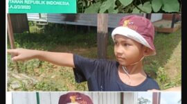 Keterangan Foto Dokumen | Kawalkaltim.com — Eno, bocah yang sejak kecil kerap mengikuti mendiang ayahnya mengelola kebun karet dan ladang keluarga, tampak sedih saat memperlihatkan area lahan yang kini diduga telah digarap PT NPR. Potret ini menjadi gambaran pilu konflik lahan yang dialami masyarakat di Barito Utara. (Dokumentasi dan sumber informasi dikutip dari TrackPeristiwa.com/Henryanus Achiang).